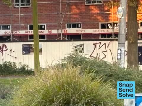 Graffiti on a fence, building or structure, a report photo