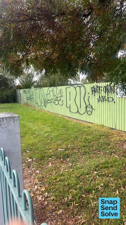 Graffiti on a fence, building or structure — a report photo