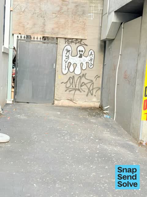 Graffiti on a fence, building or structure — a report photo