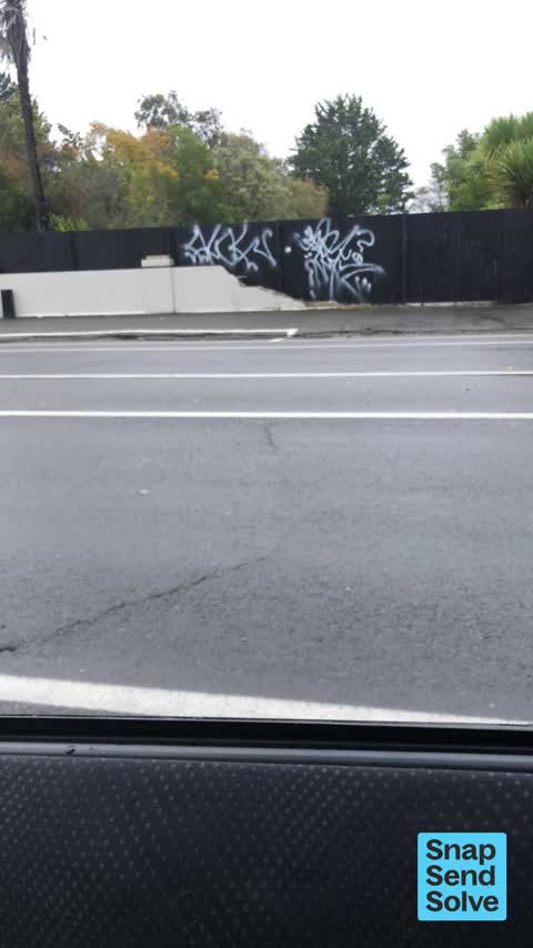 Graffiti on a fence, building or structure — a report photo