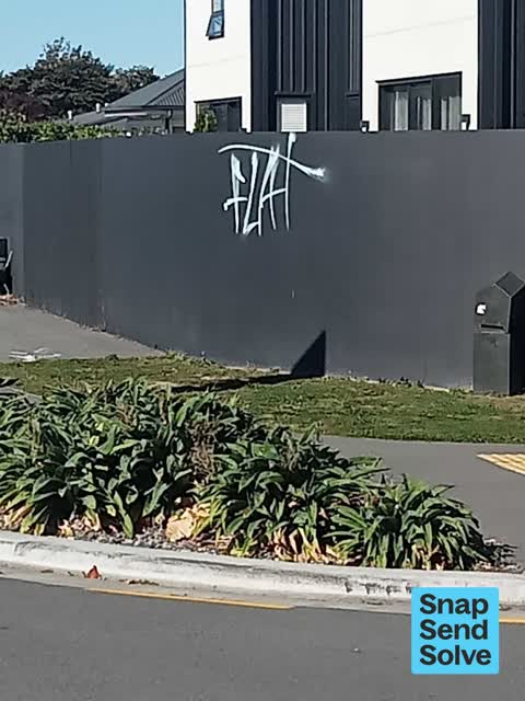 Graffiti on a fence, building or structure, a report photo