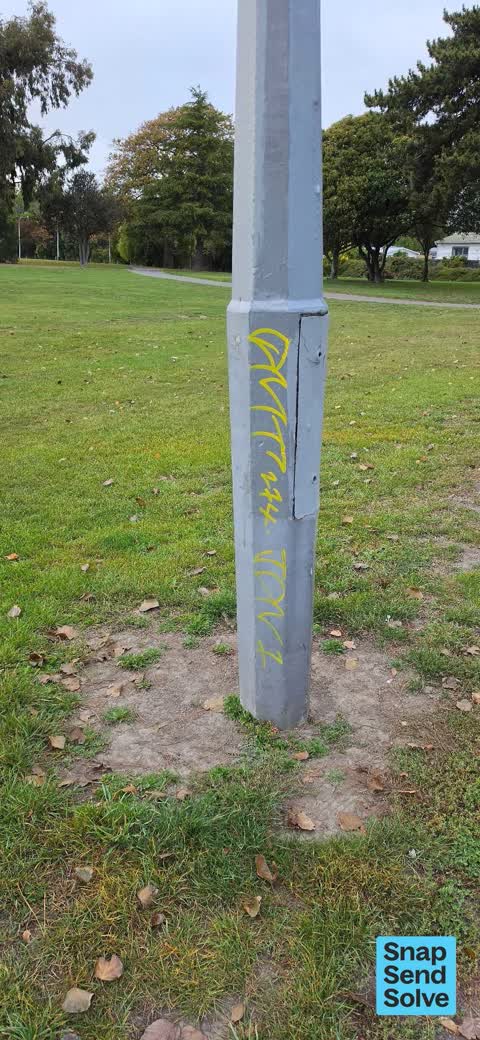 Graffiti on a traffic light pole or cabinet, or wa, a report photo