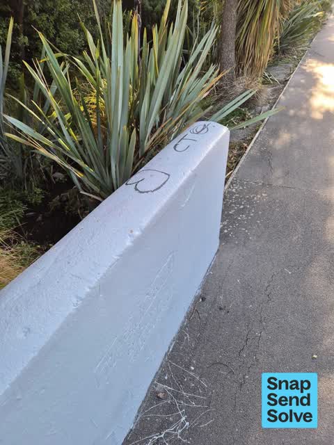 Graffiti on a road, footpath or bridge, a report photo