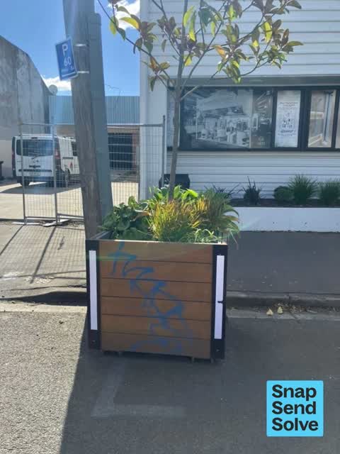 Graffiti on a fence, building or structure, a report photo