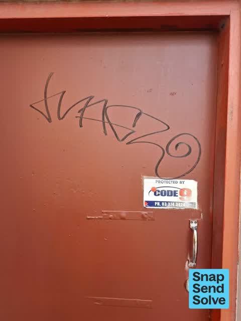 Graffiti on a fence, building or structure, a report photo