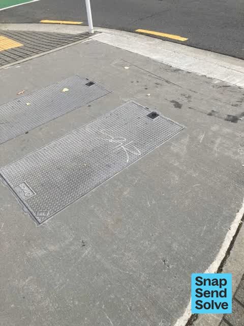 Graffiti on a road, footpath or bridge — a report photo