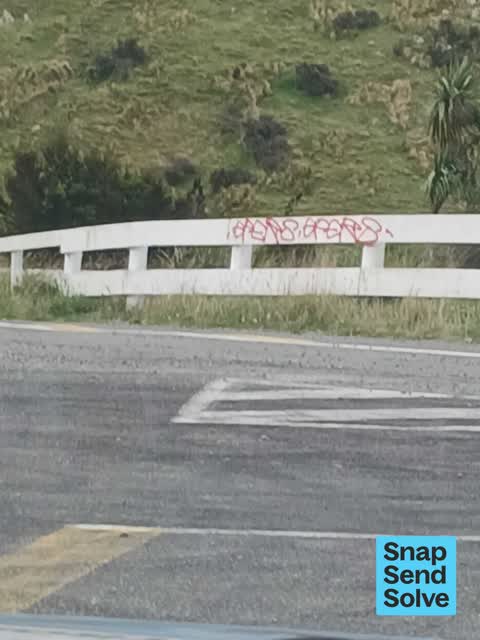 Graffiti on a road, footpath or bridge, a report photo