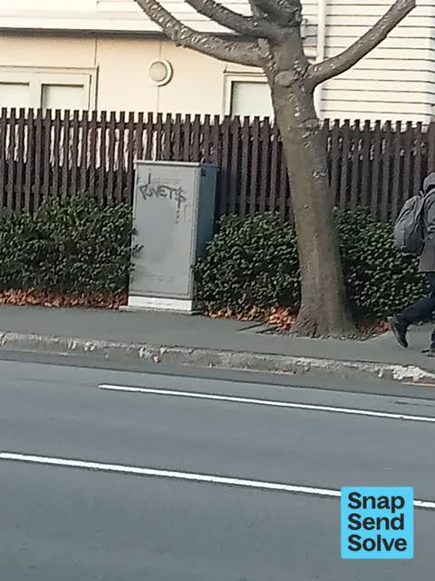 Graffiti on a traffic light pole or cabinet, or wa, a report photo