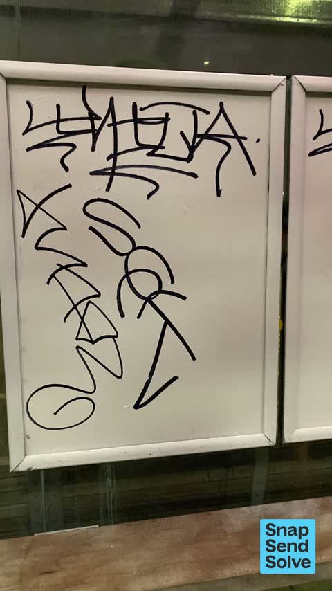 Graffiti on a bus stop or public toilet, a report photo