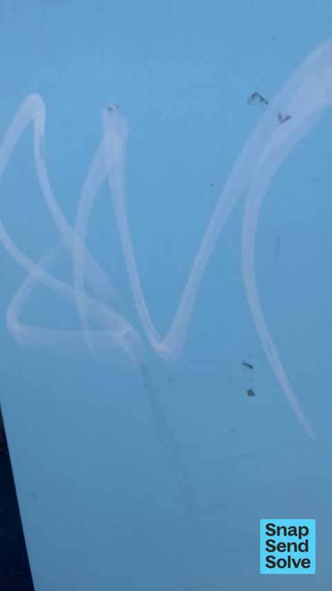 Graffiti on a traffic light pole or cabinet, or wa, a report photo