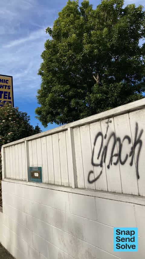 Graffiti on a fence, building or structure, a report photo