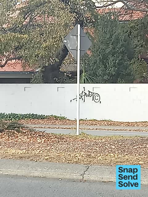 Graffiti on a fence, building or structure, a report photo