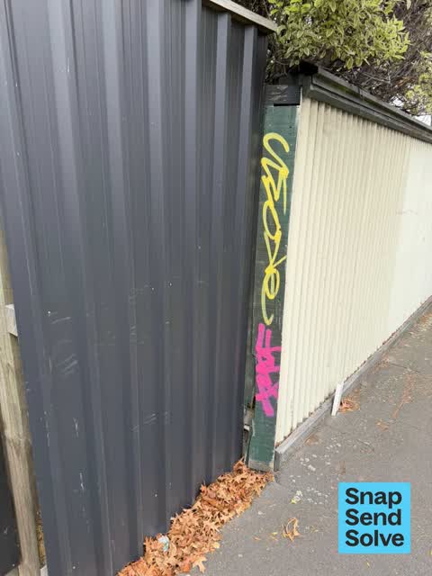 Graffiti on a fence, building or structure, a report photo