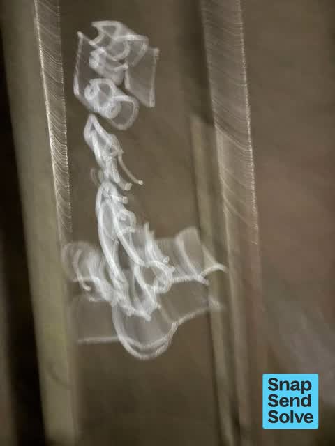 Graffiti on a bus stop or public toilet, a report photo