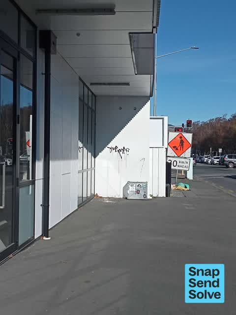 Graffiti on a fence, building or structure — a report photo
