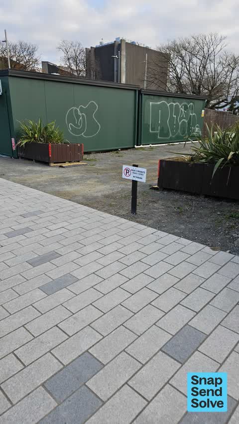 Graffiti on a fence, building or structure, a report photo