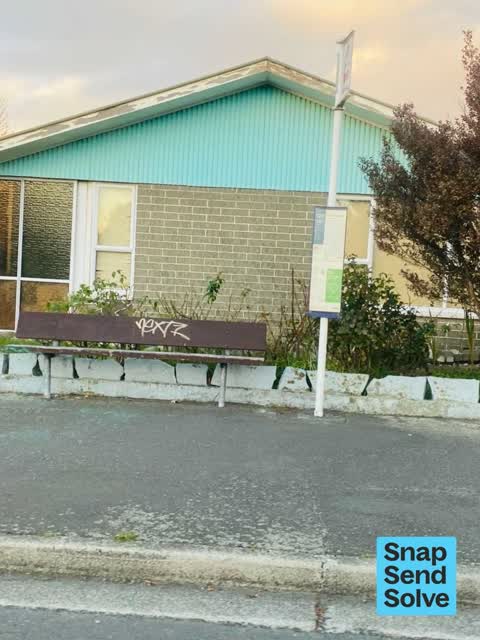 Graffiti on a bus stop or public toilet, a report photo