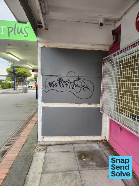 Graffiti on a fence, building or structure, a report photo