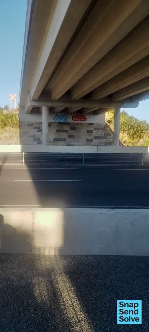 Graffiti on a fence, building or structure, a report photo