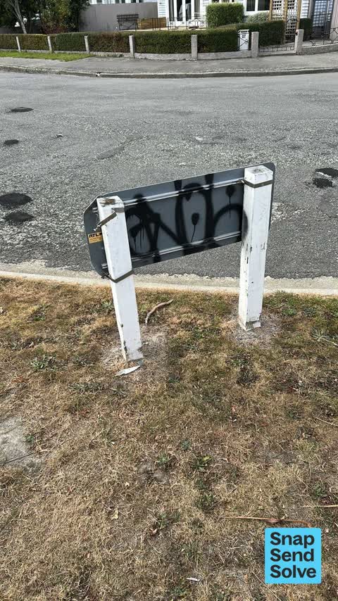 Graffiti on a sign, mural or public art, a report photo