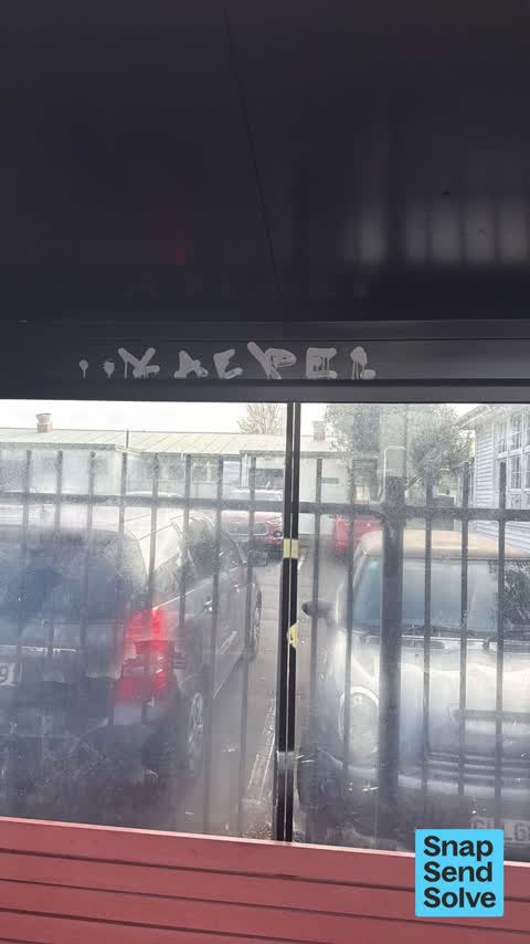 Graffiti on a bus stop or public toilet — a report photo