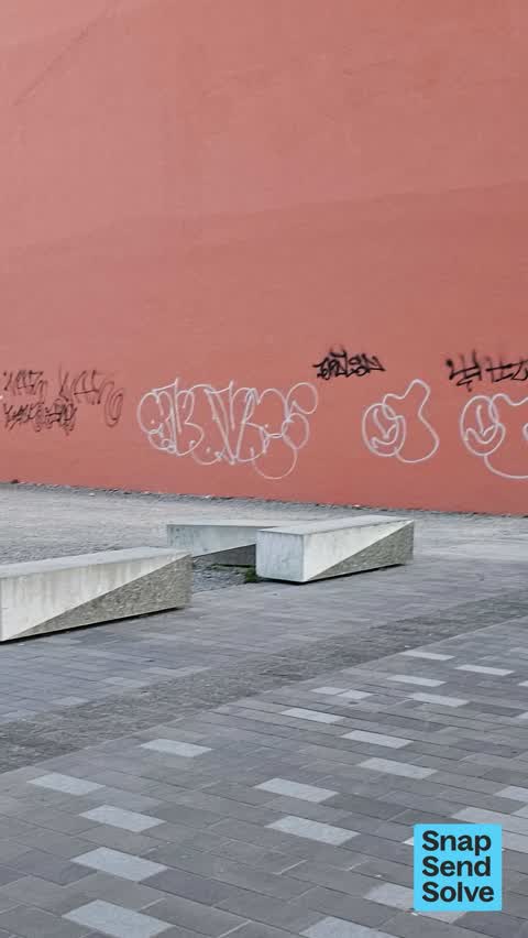 Graffiti on a fence, building or structure — a report photo