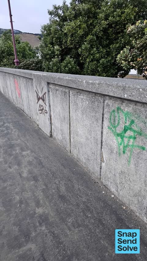 Graffiti on a fence, building or structure, a report photo