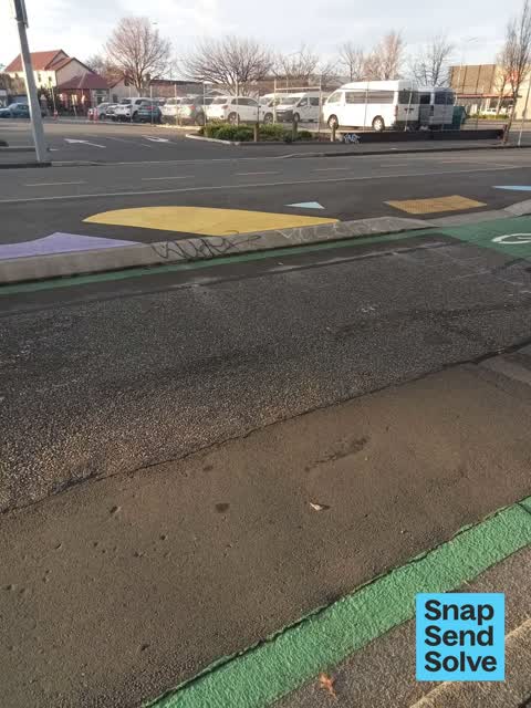 Graffiti on a road, footpath or bridge, a report photo