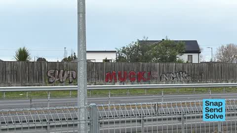 Graffiti on a fence, building or structure, a report photo