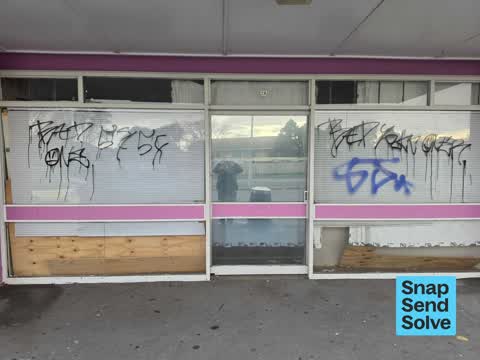 Graffiti on a fence, building or structure — a report photo