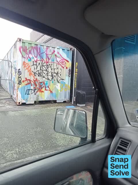 Graffiti on a fence, building or structure, a report photo
