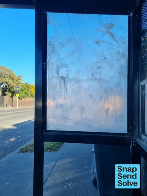 Graffiti on a bus stop or public toilet, a report photo