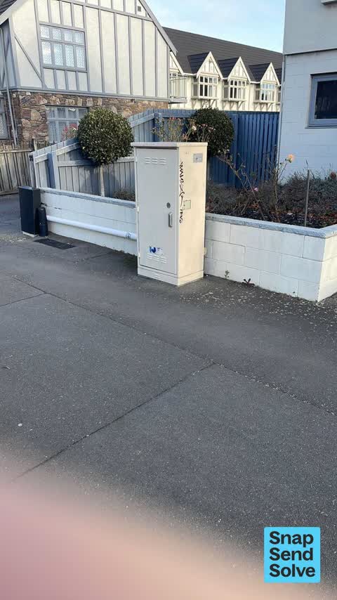 Graffiti on a traffic light pole or cabinet, or wa, a report photo