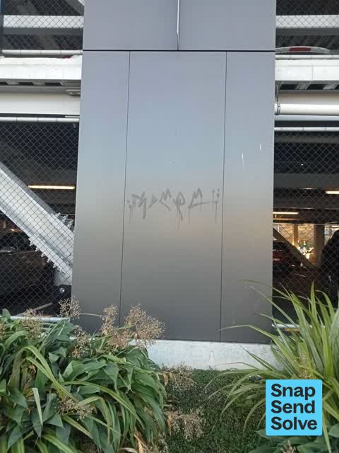 Graffiti on a fence, building or structure — a report photo