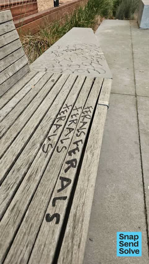 Graffiti on a fence, building or structure, a report photo