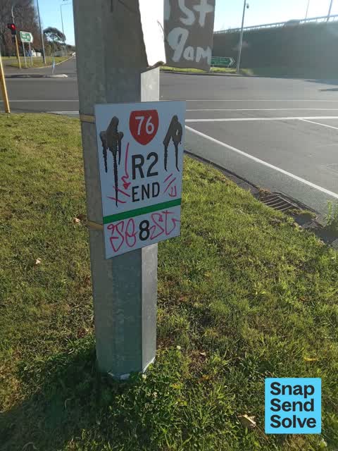 Graffiti on a sign, mural or public art, a report photo