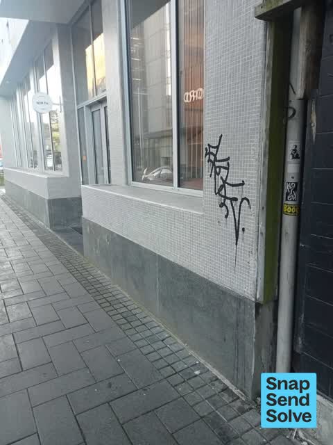 Graffiti on a fence, building or structure, a report photo