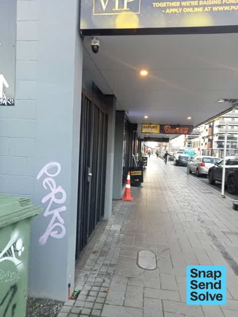 Graffiti on a fence, building or structure, a report photo