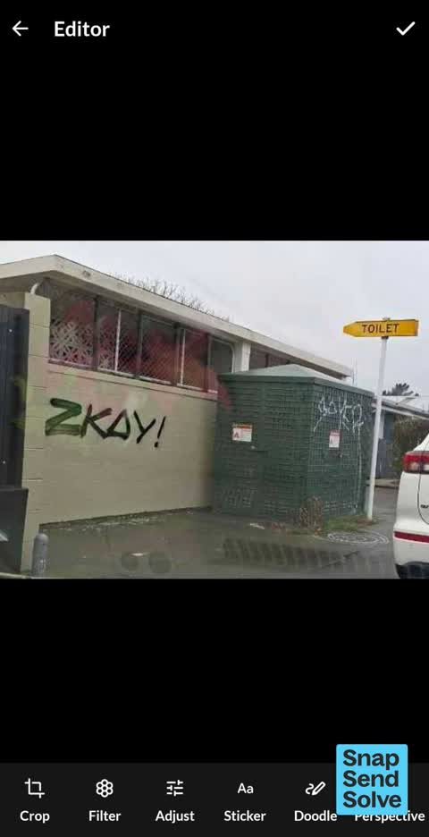 Graffiti on a bus stop or public toilet — a report photo