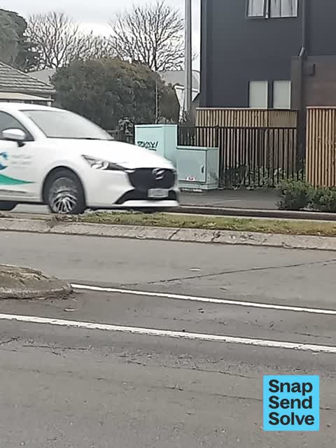Graffiti on a traffic light pole or cabinet, or wa, a report photo