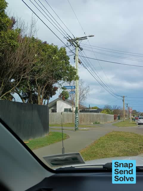 Graffiti on a fence, building or structure, a report photo