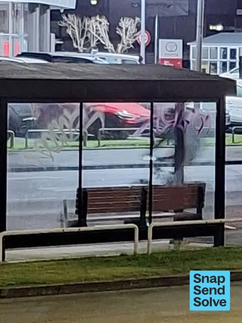 Graffiti on a bus stop or public toilet — a report photo