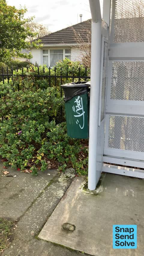 Graffiti on a bus stop or public toilet, a report photo