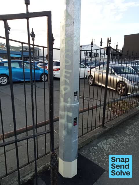 Graffiti on a fence, building or structure, a report photo