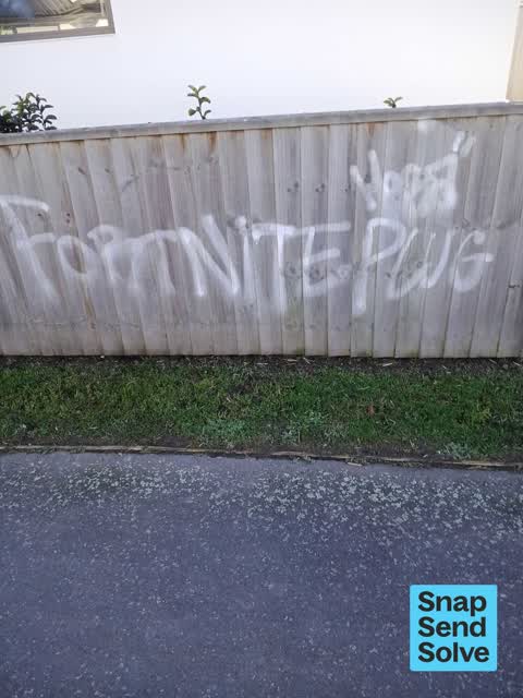 Graffiti on a fence, building or structure, a report photo