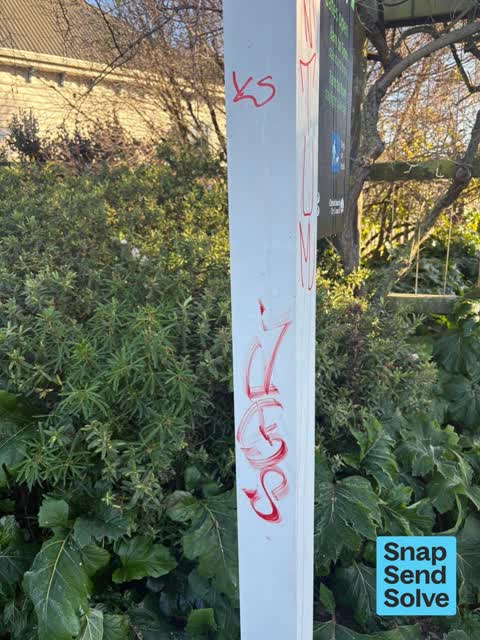 Graffiti on a sign, mural or public art, a report photo