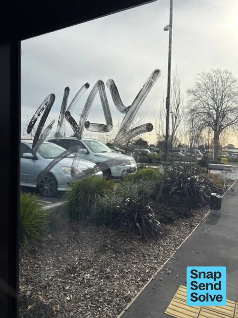 Graffiti on a bus stop or public toilet, a report photo