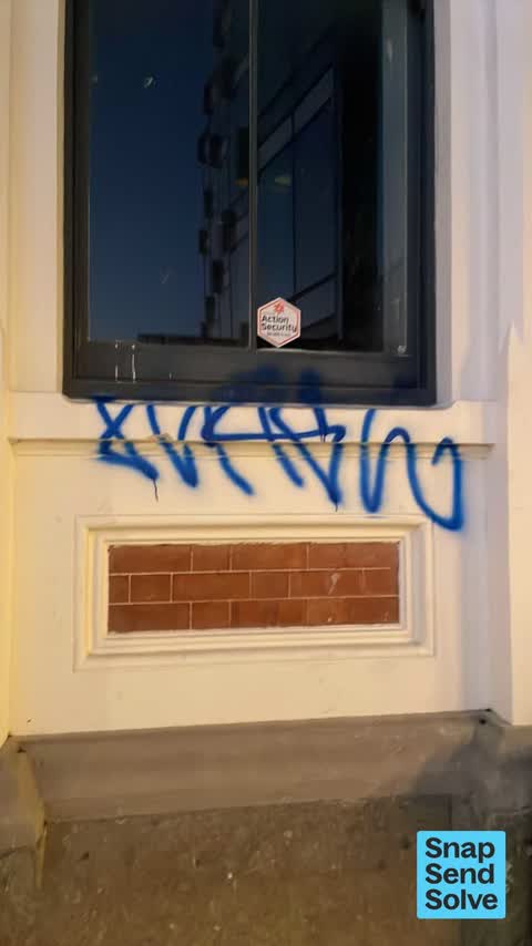 Graffiti on a fence, building or structure — a report photo