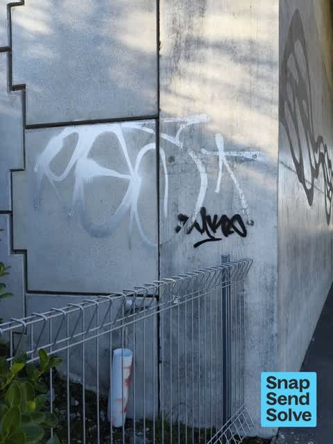 Graffiti on a road, footpath or bridge, a report photo