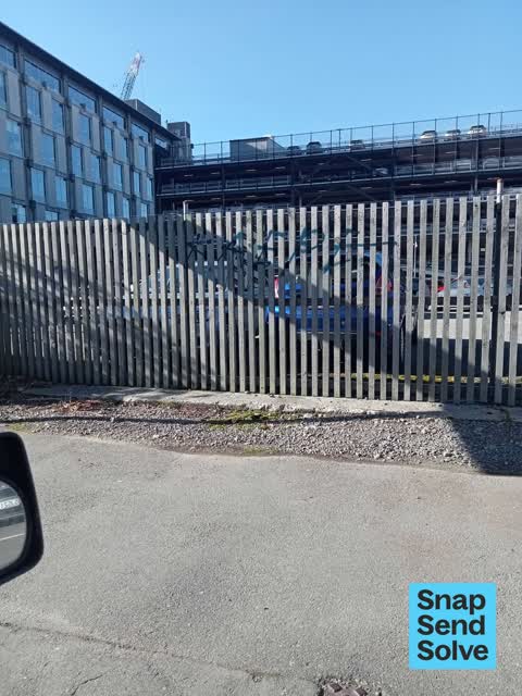 Graffiti on a fence, building or structure — a report photo